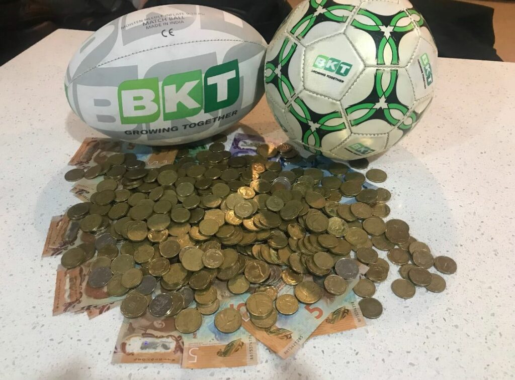 BKT Sports Ball giveaway for coin donation at AgQuip Field Day event